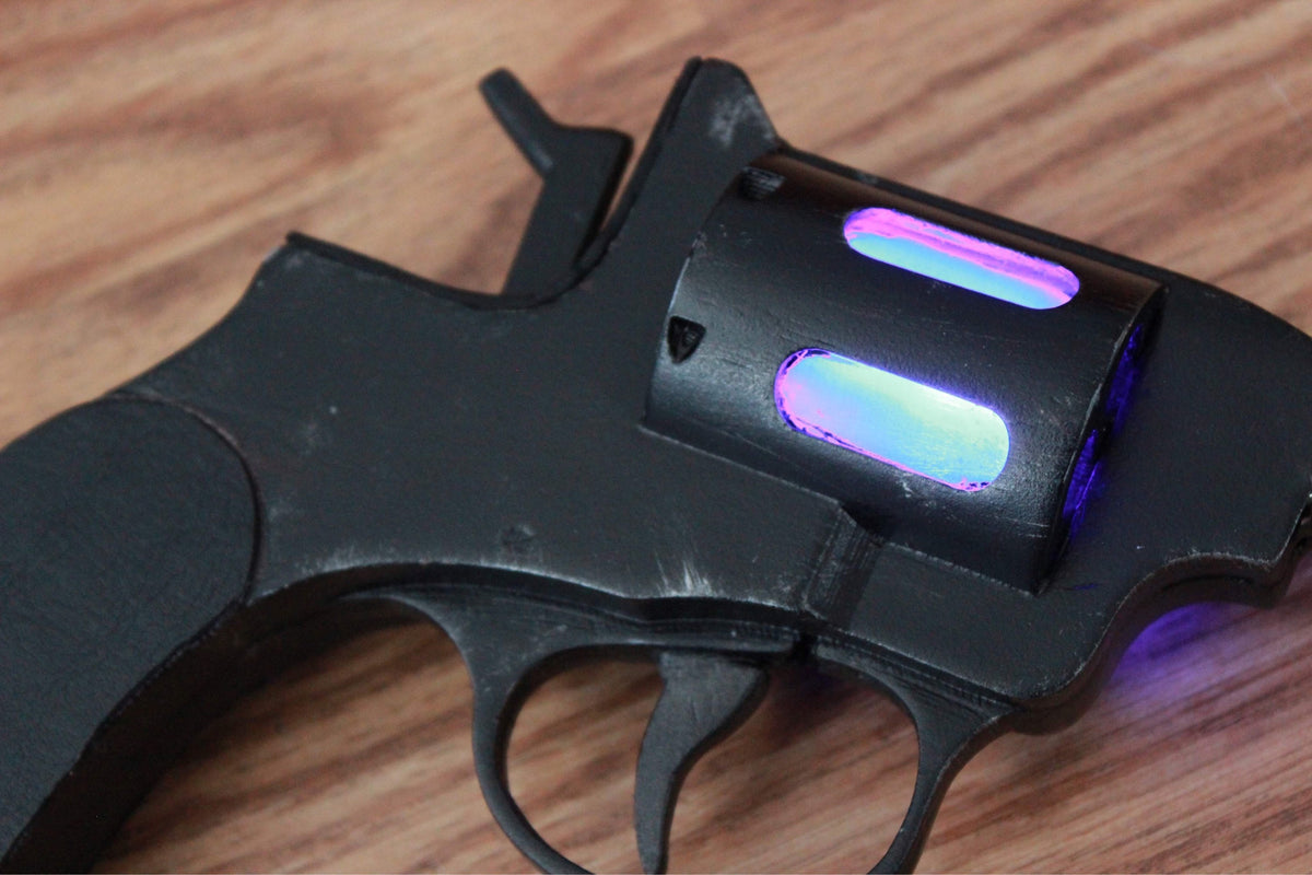 Rip Hunter's prop gun replica with orange safety tip
