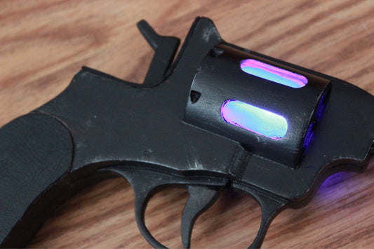 Rip Hunter's prop gun replica with orange safety tip