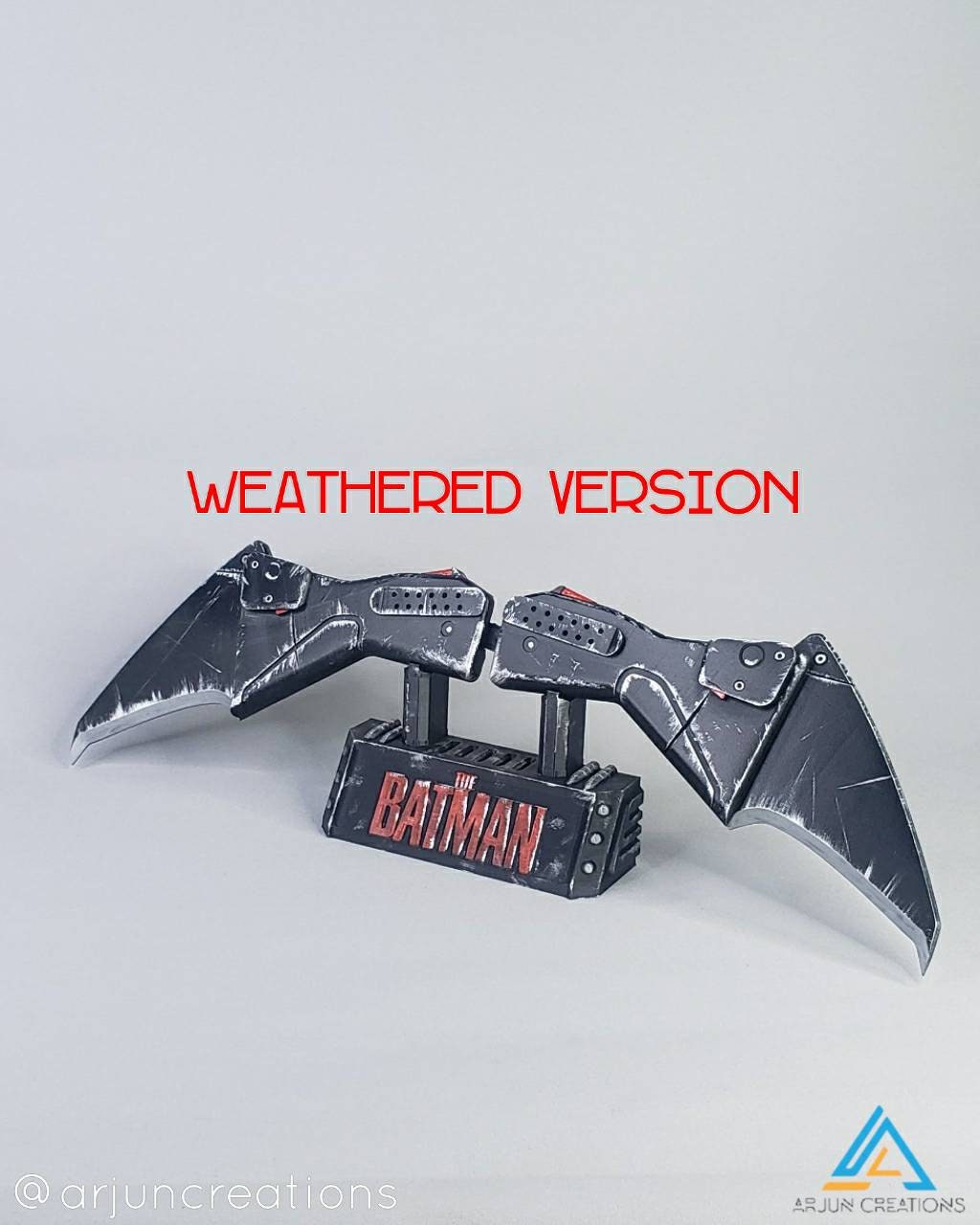 Bat-themed chest emblem throwing blade prop