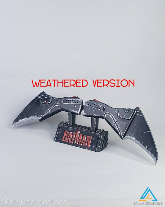 Bat-themed chest emblem throwing blade prop